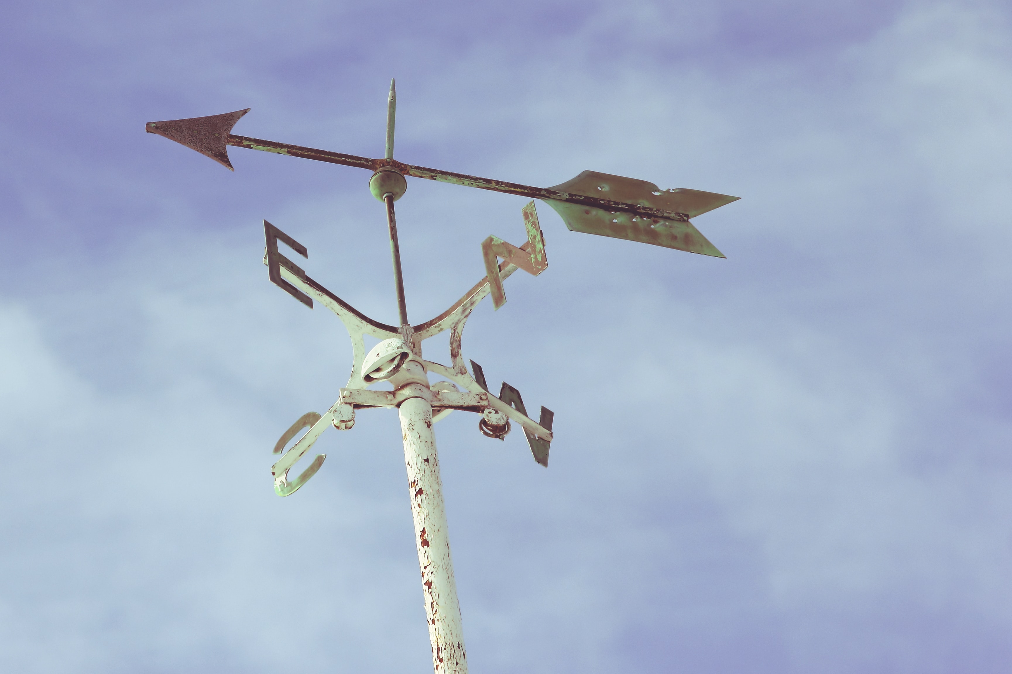 photo of a windvane with compass directions N, S, E, W