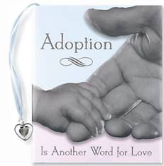 Adoption - infant's hand in adults