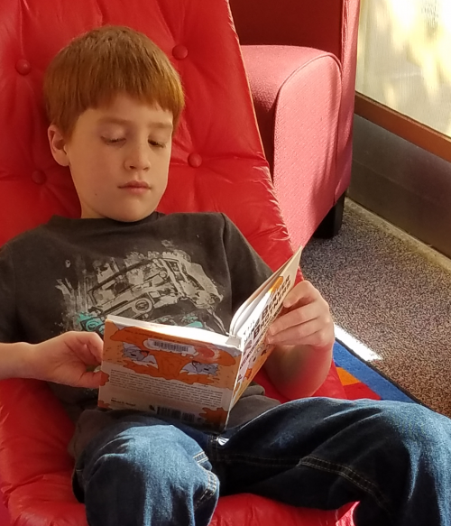 Child reading book