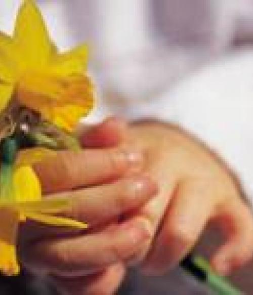 Child holding flowers