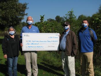 Photo of Grant Award from Duke Energy to Henderson Soil and Water Conservation District